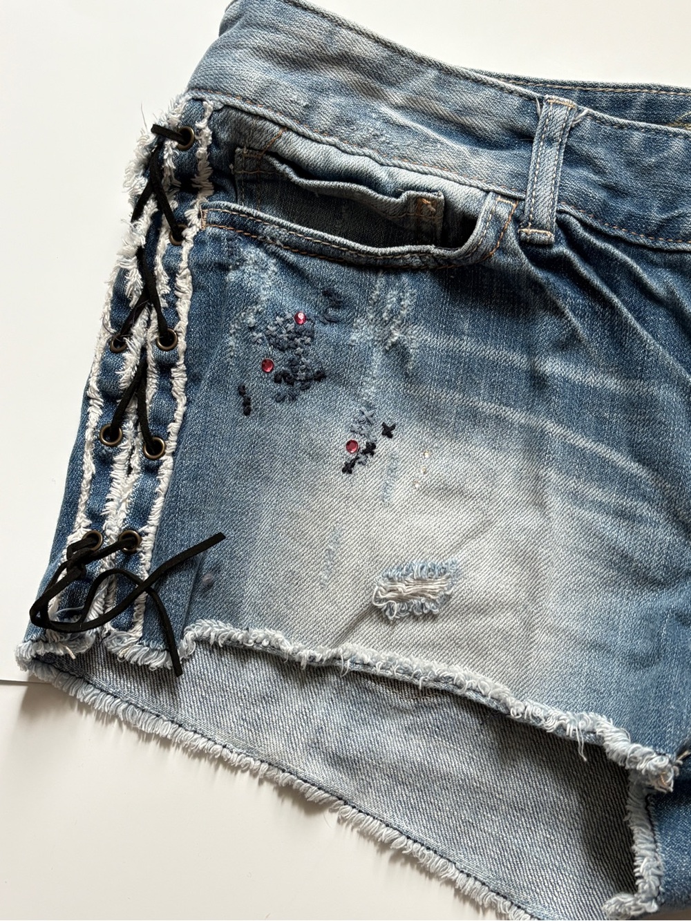 Y2K Express Light Blue Distressed Denim Lace-Up Women’s Shorts